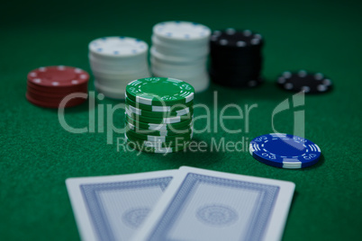 Close-up of chips with cards