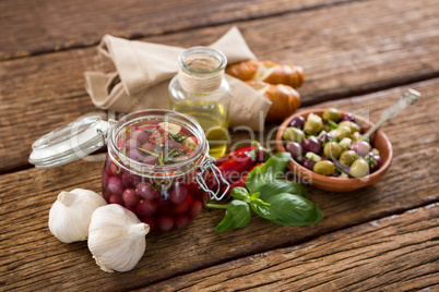 Pickled olives with ingredients and bread