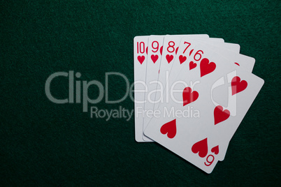 Playing cards arranged on poker table