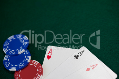 Playing cards and casino chips on poker table