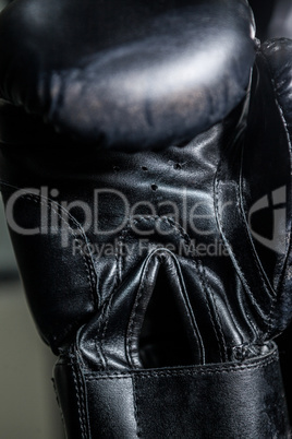 Boxing glove in fitness studio
