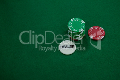 High angle view of dealer coin with chips