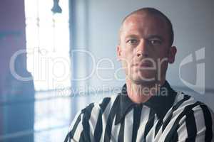 Close-up portrait of young male referee