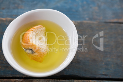 Piece of bread soaked in olive oil