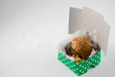 Cheeseburger with french fries in box