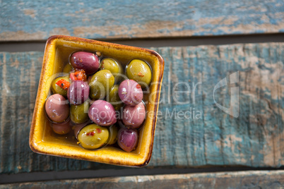 Close-up of marinated olives in bowl