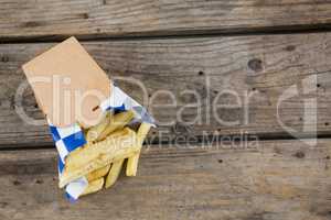 High angle view of French fries on table