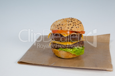 Close-up of hamburger on brown paper