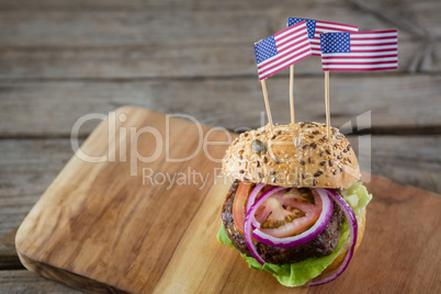 Close up of burger with american flag