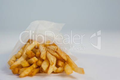 French fried chips on table