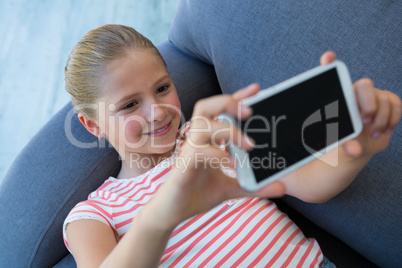 High angle view of girl taking selfie