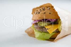 Close up of hamburger in paper bag
