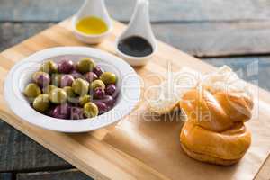 Marinated olives with bread and olive oil