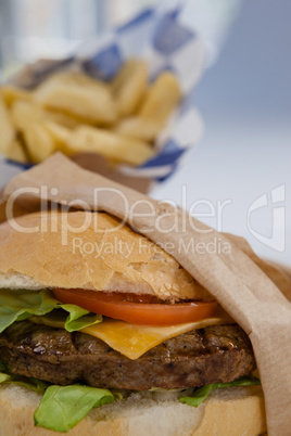 Close-up of hamburger in paper bag