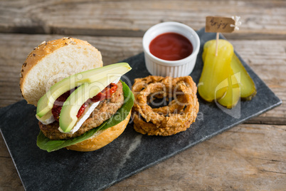 High angle view of food with burger on slate