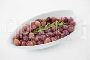 Olives garnished with rosemary