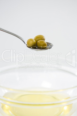 Olives in spoon