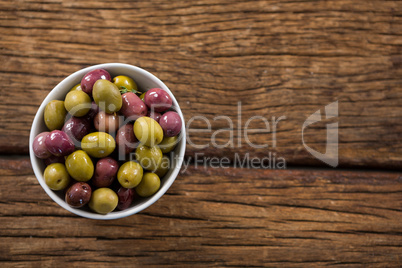 Marinated olives in white bowl