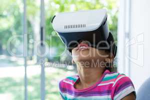 Close up of girl wearing virtual reality simulator