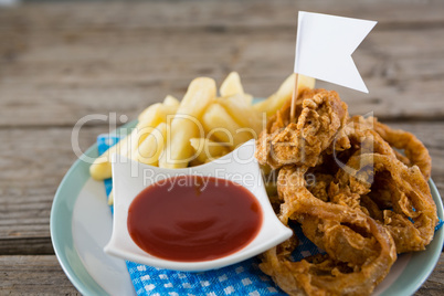 Onion rings with French fries