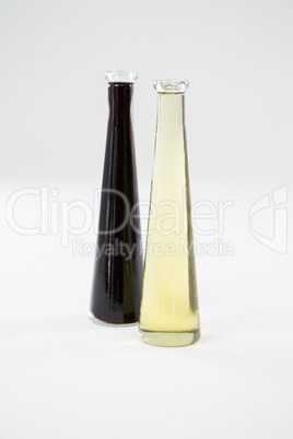 Green and purple olive oil bottles