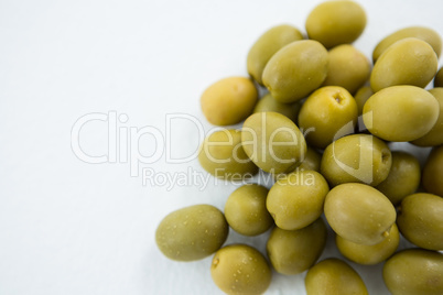 Close-up of marinated green olives