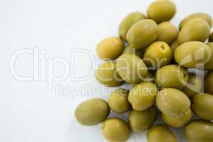 Close-up of marinated green olives