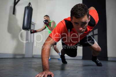 Male boxers exercising in fitness studio