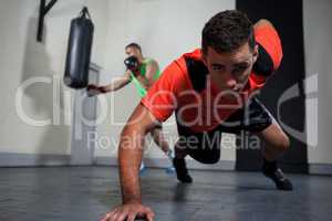 Male boxers exercising in fitness studio