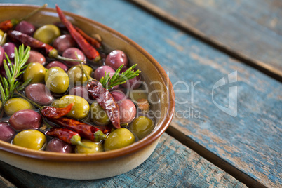 Close-up of pickled olives in bowl