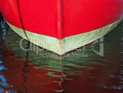 Red boat in marina