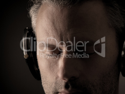 Man listening music with headphones