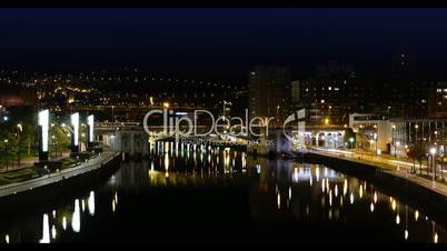 Bilbao - Deustuko Zubia over Ria del Nervion at night - time lapse