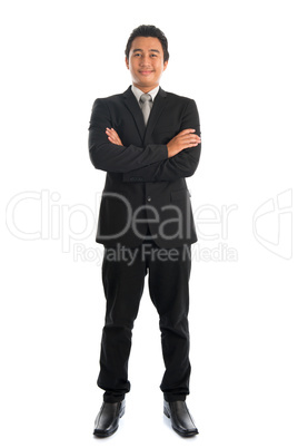 Full body Asian businessman arms crossed