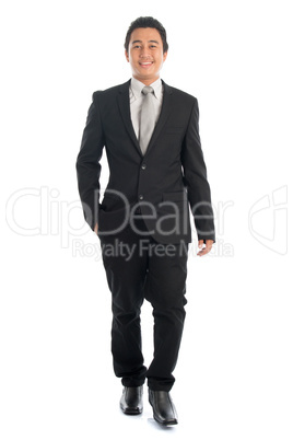 Full body Asian business people walking