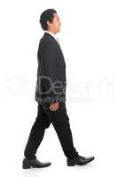 Side view Asian business man walking