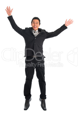 Southeast Asian businessman jumping