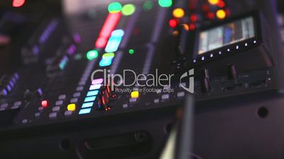 Professional audio console in a concert, sound mixer console during a concert