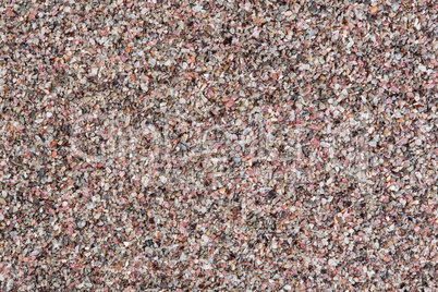 Macro photo of red small stones. Quartz.