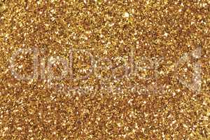 Background filled with shiny gold glitter.