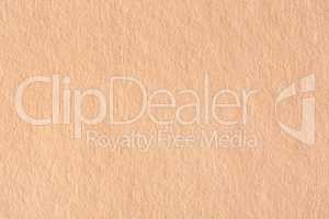 Abstract light brown paper background.