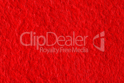 Abstract background with red felt texture, velvet fabric.