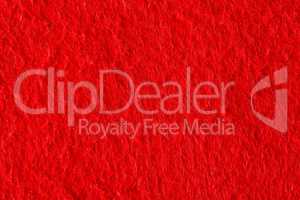 Abstract background with red felt texture, velvet fabric.