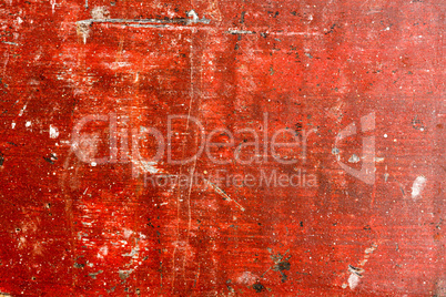Grunge red painted wooden textured background.