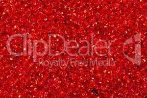 Background of bright red seed beads.