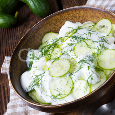 fresh cucumber salad with yogurt and young potatoes