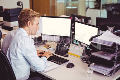 High angle view of businessman working on computer at desk