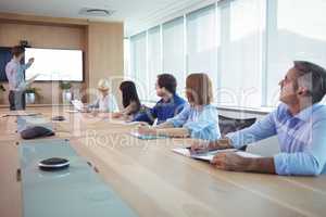 Business people at conference table during meeting