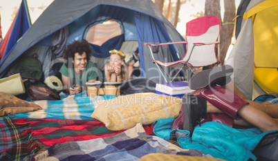 Couple lying in tent