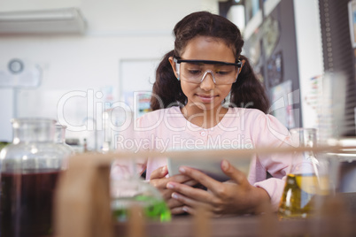 Elementary student using digital tablet